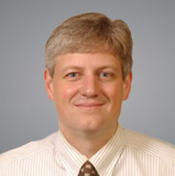 John W. Theus headshot