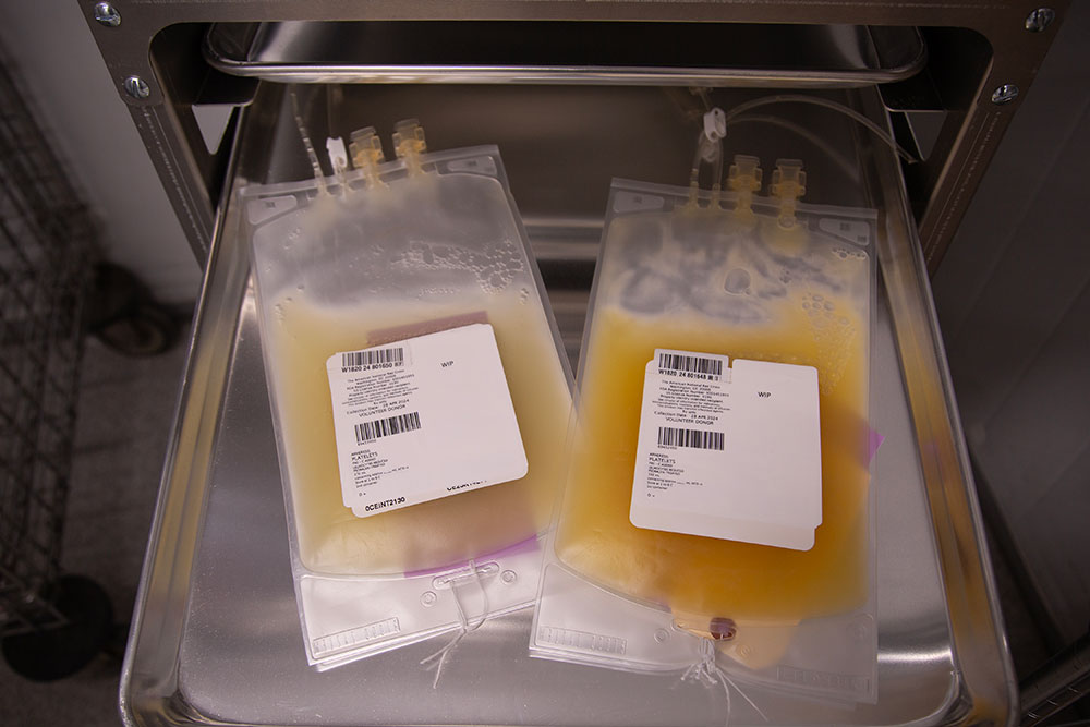 Two bags of Cold Storage Platelets on metal tray.